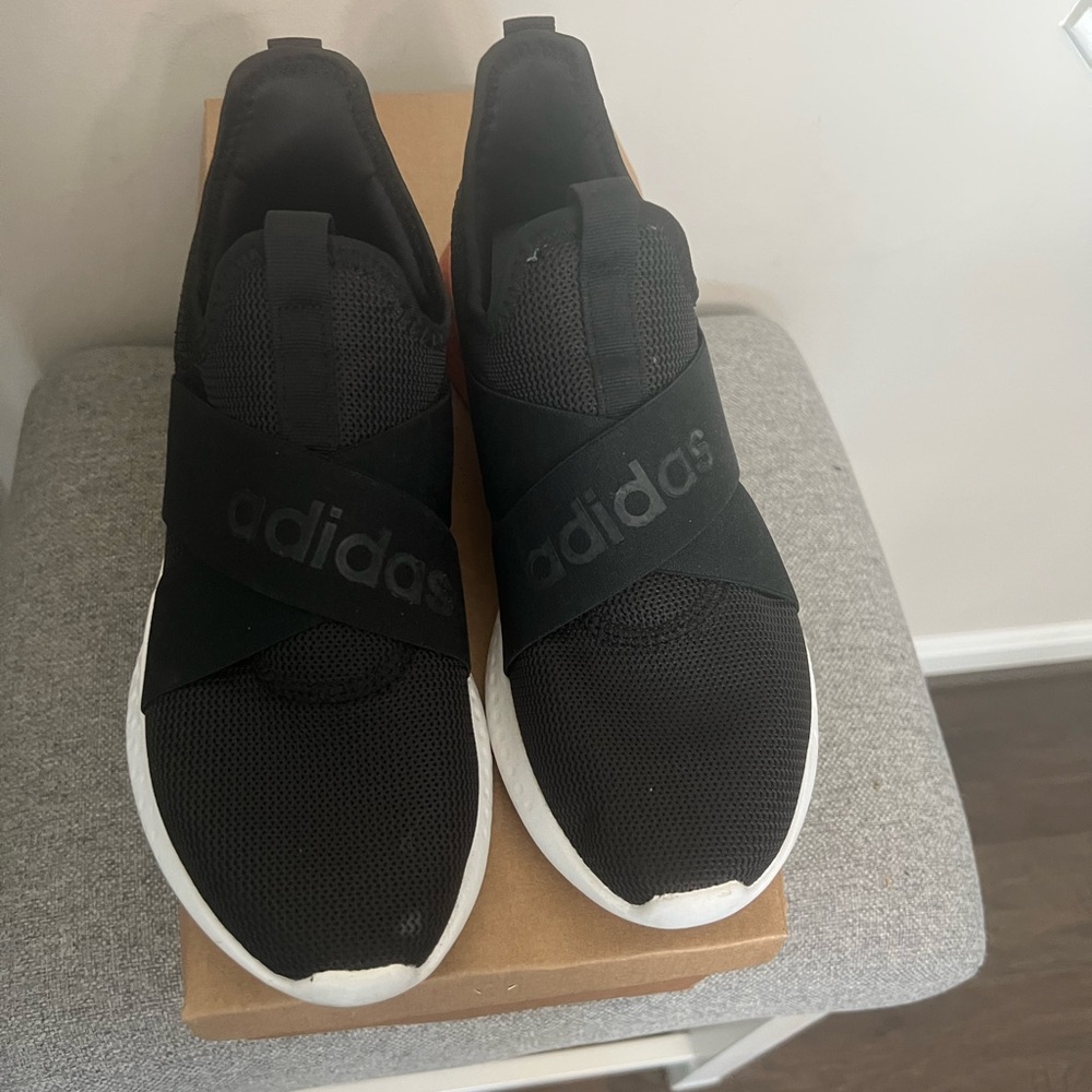 Adidas Women's Black and White Slip-On Sneakers